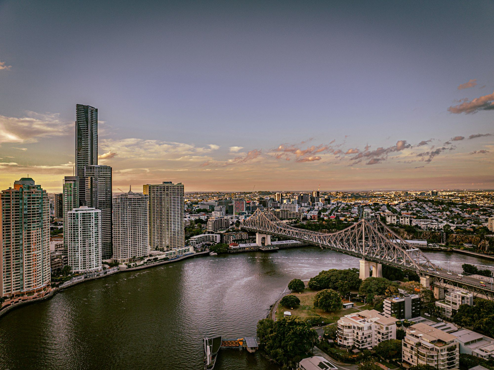 The Story Bridge crossing the Brisbane River with the Brisbane city skyline behind